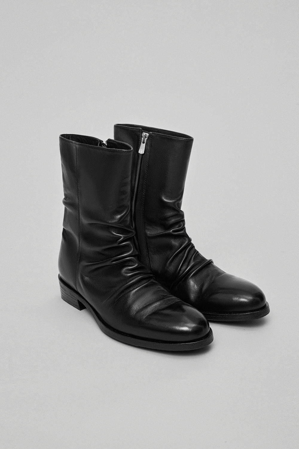 Pair of YITAI Horsehide Leather Boots with YKK Excella side zippers, a refined silhouette, and a low stacked heel.