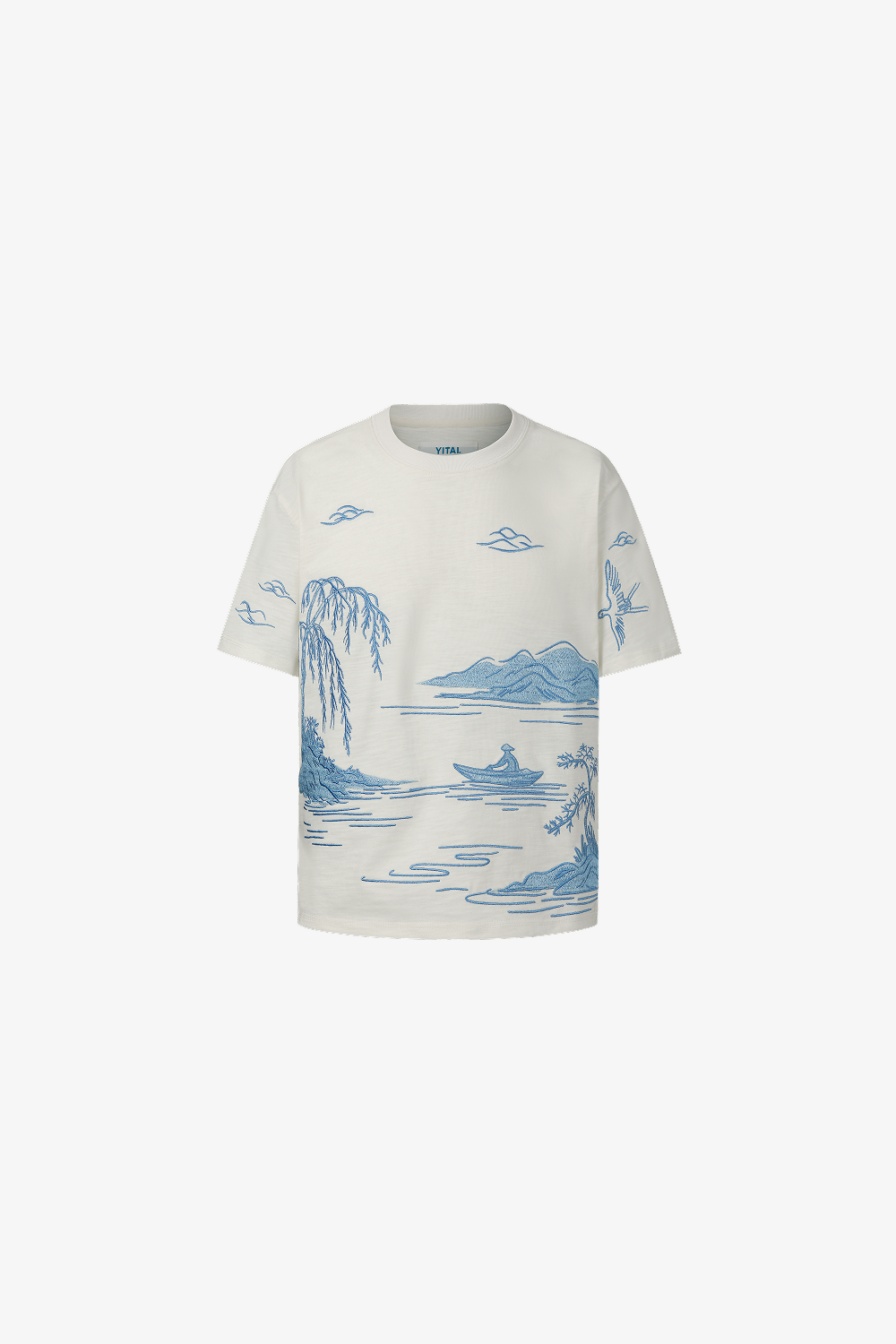 White t-shirt with blue landscape embroidery on a white background