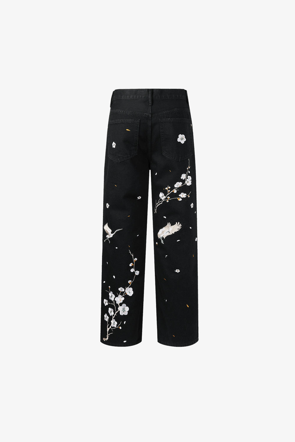 Back View of black jeans with white floral embroidery on a white background