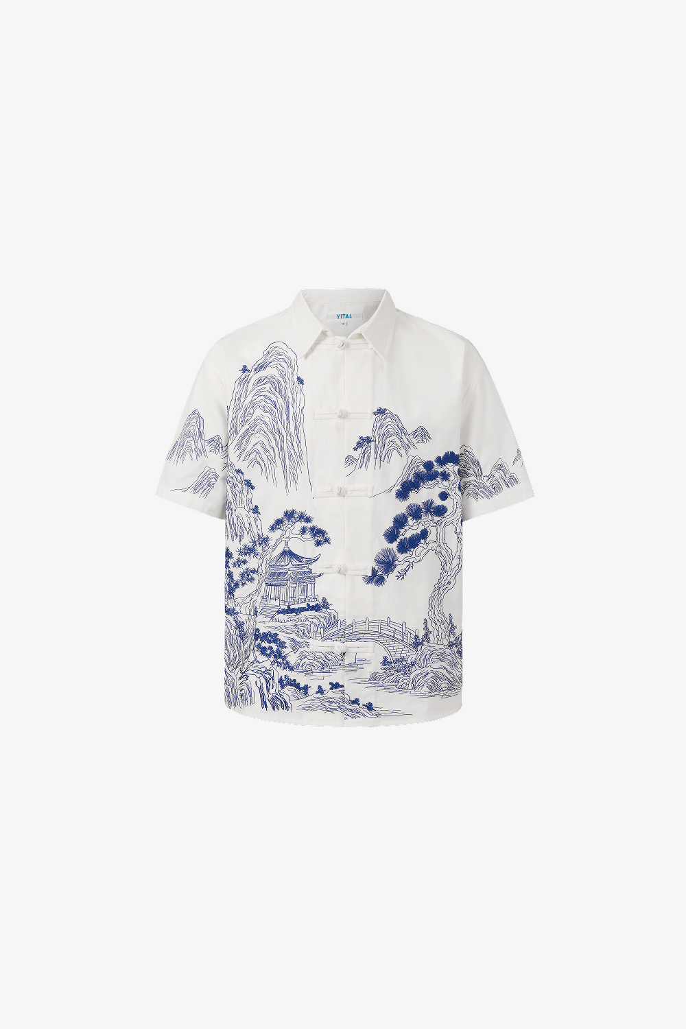 White shirt with traditional Chinese blue landscape embroidery on a white background.