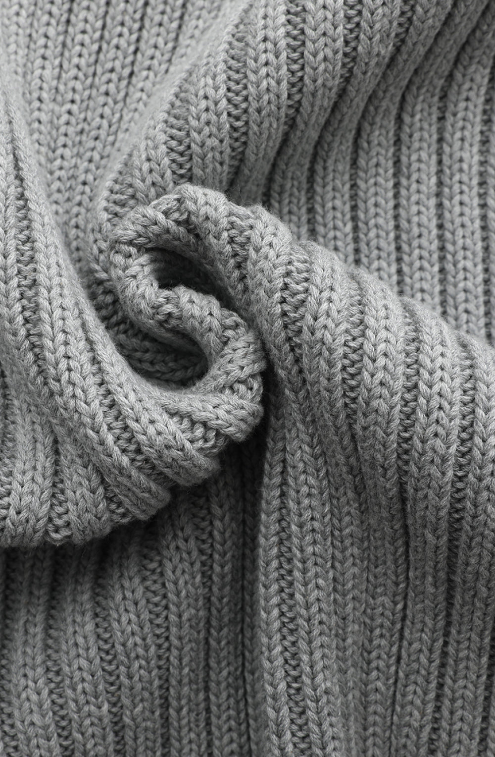 Close-up of a gray ribbed knitted fabric