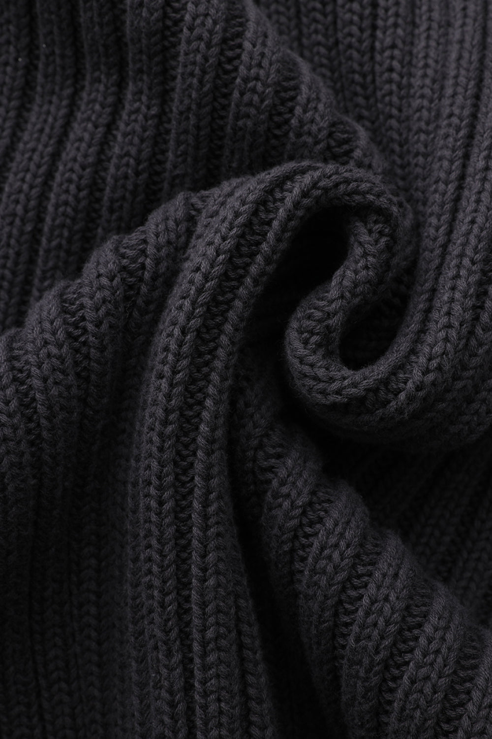Close-up of black knitted fabric