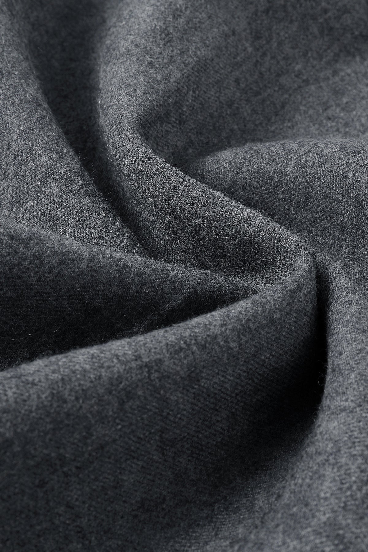Close-up of grey wool fabric texture.