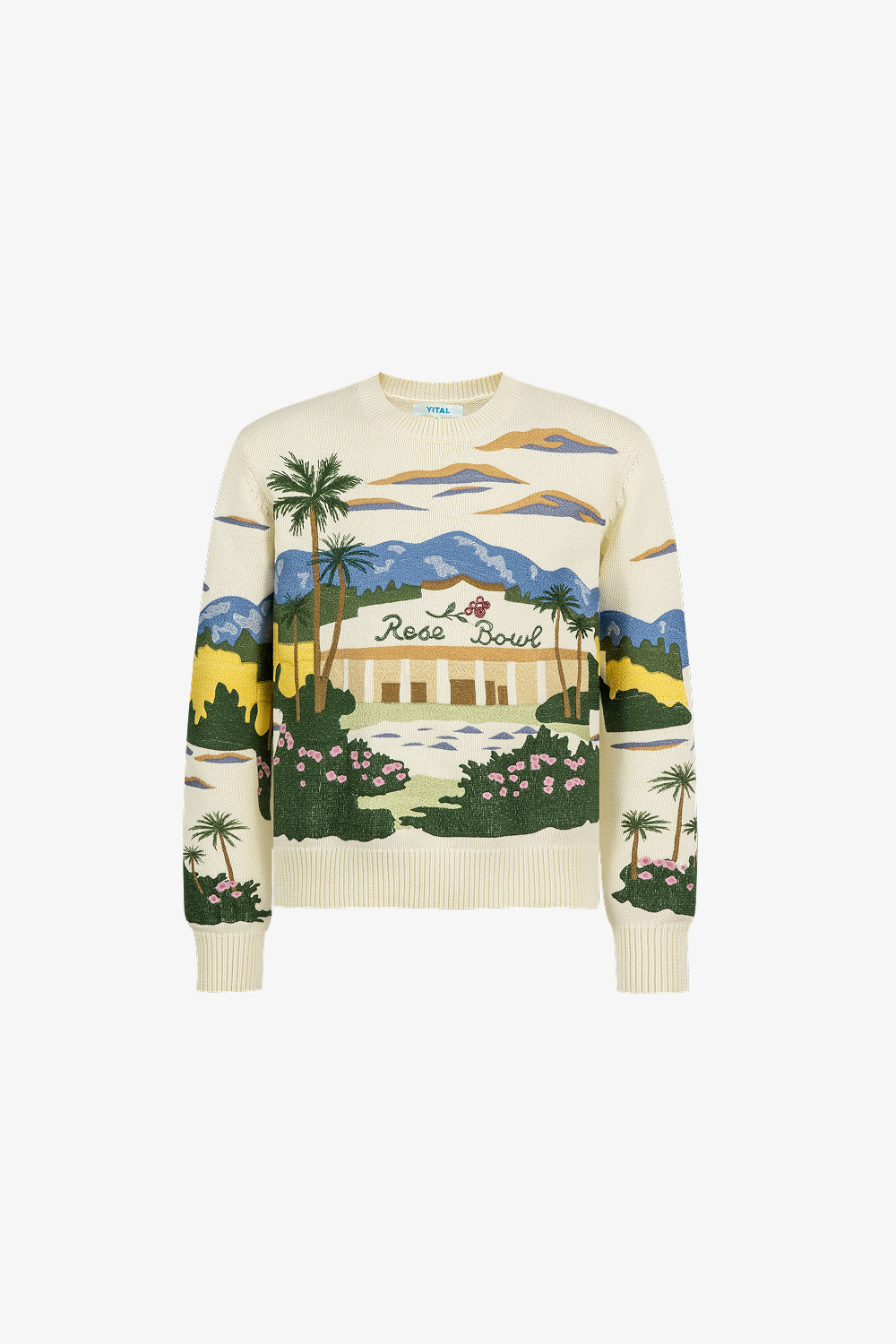 Sweater with a scenic embroidery of a building and palm trees on a white background