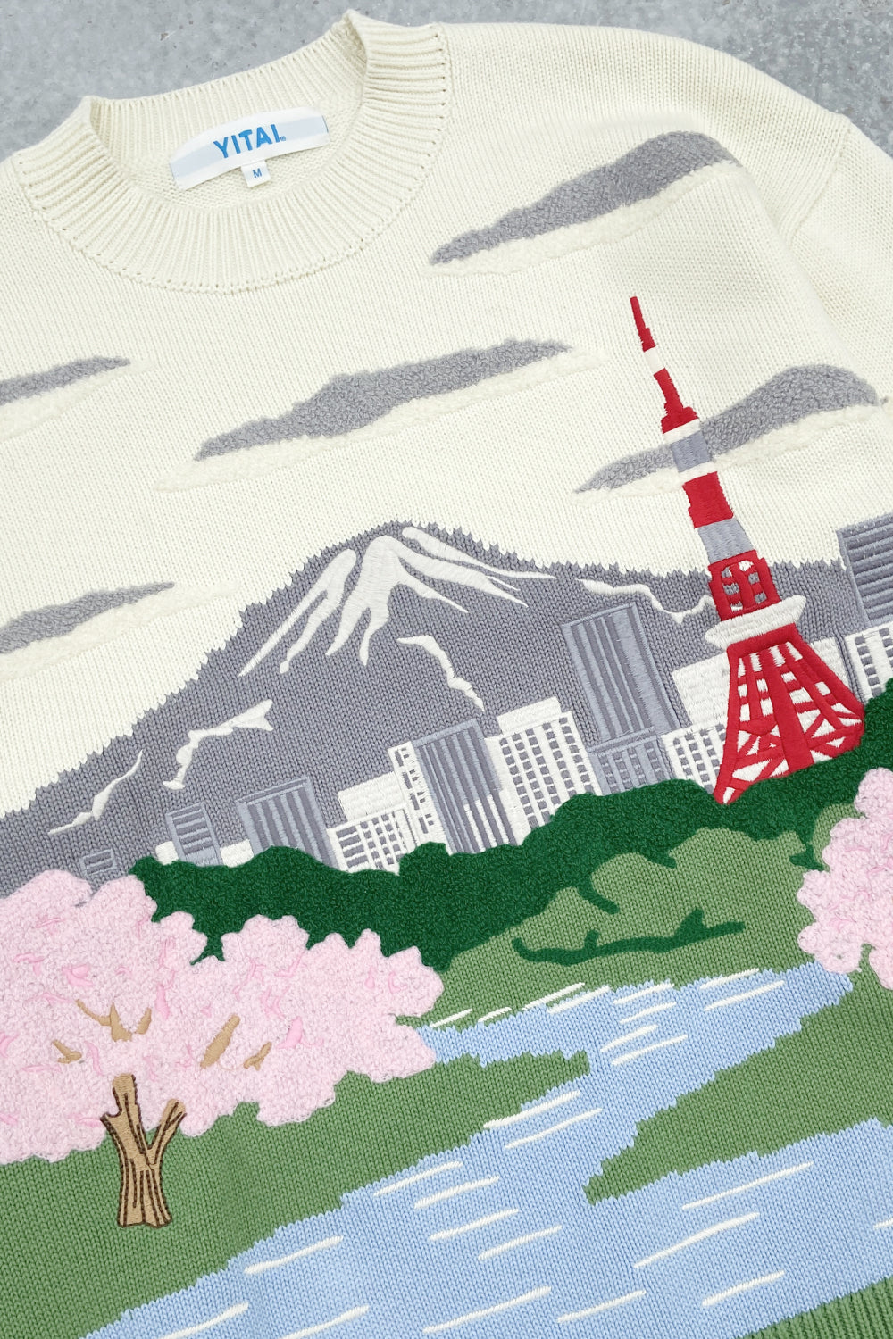 Sweater with a design of Mount Fuji, cherry blossoms, and the Tokyo Tower.