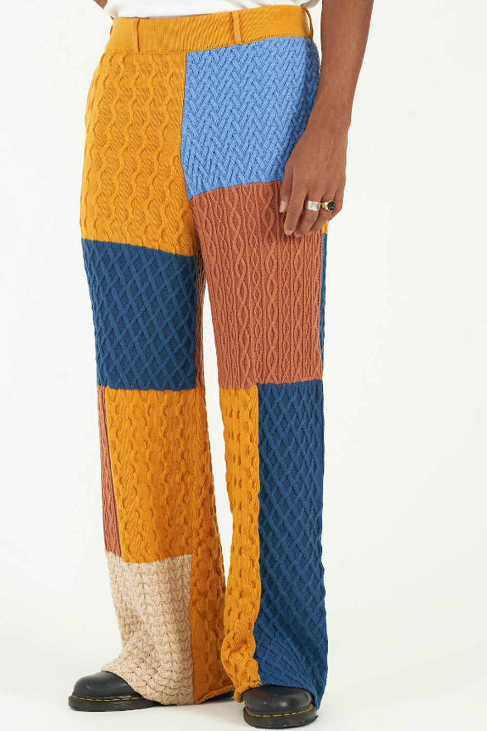 Color-blocked patterned pants on a white background
