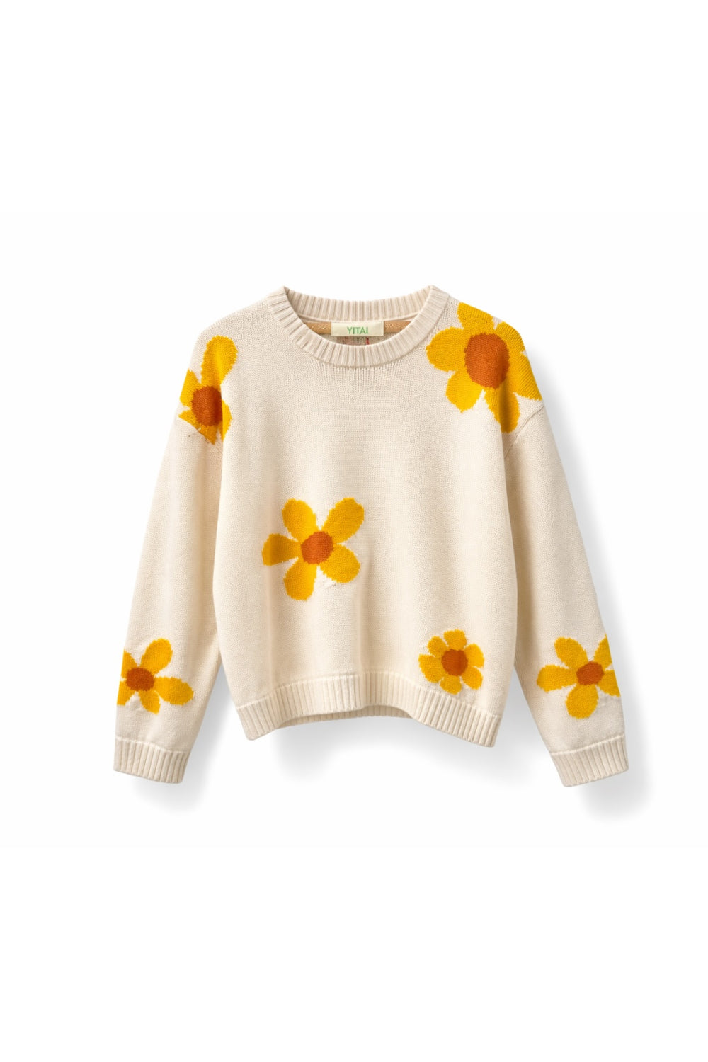 Beige sweater with yellow flower patterns on a white background