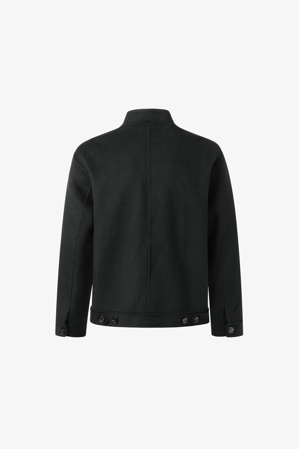 Back view of a black relaxed-fit wool jacket showing a vertical center seam and adjustable button tabs at the bottom hem.