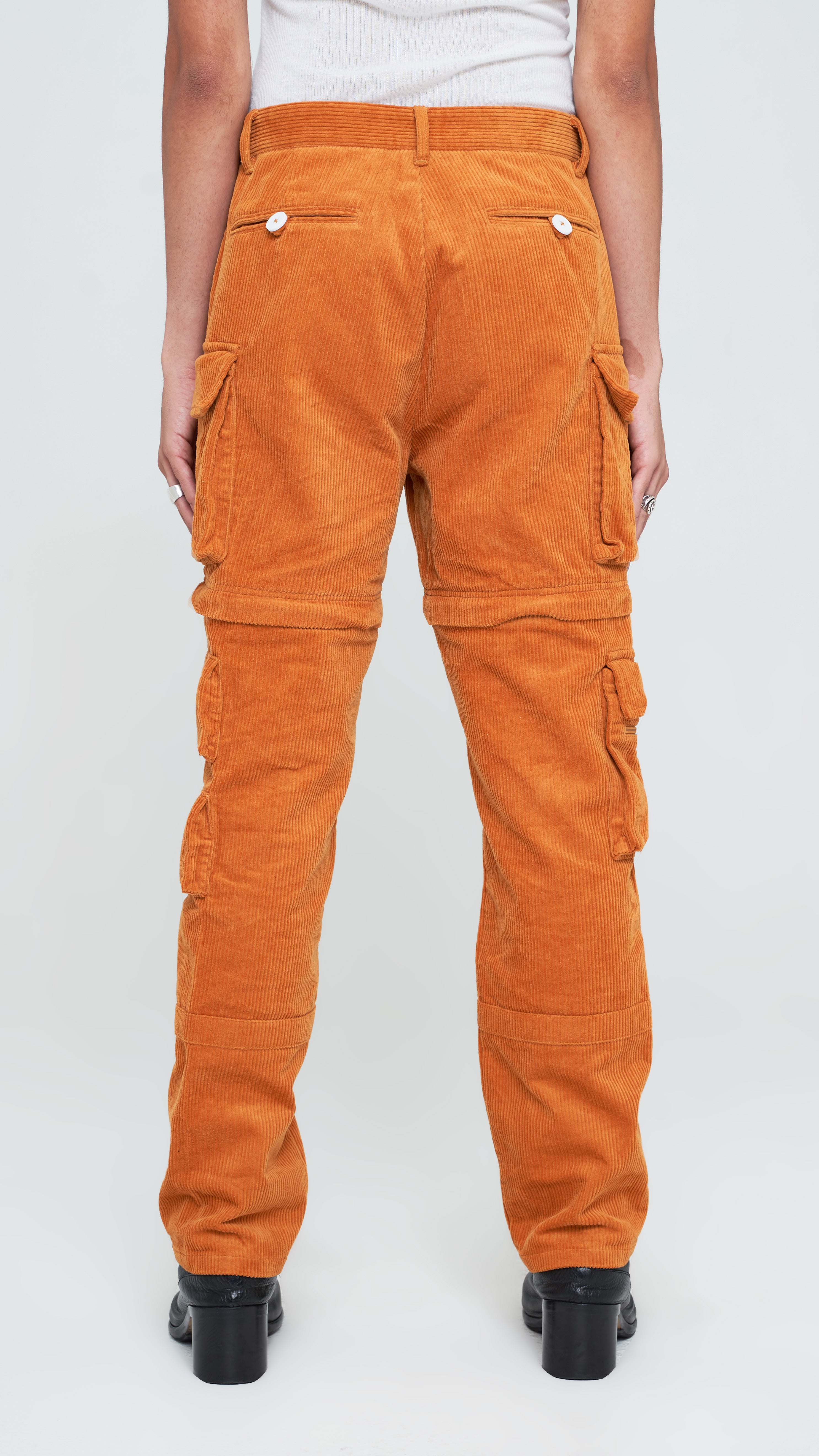 Upgraded with an improved corduroy fabric in apricot brown and better sizing. These pants are adaptable for year-round wear, these utility pants are built from a functional corduroy fabric with fair stretch. Its construction is secured with stitched panels and it's made with plenty of utilitarian appeal with multiple pockets. These trousers are competent for any season as it's zipper-adjustable and can be transformed into a pair of shorts when the temperature rises.